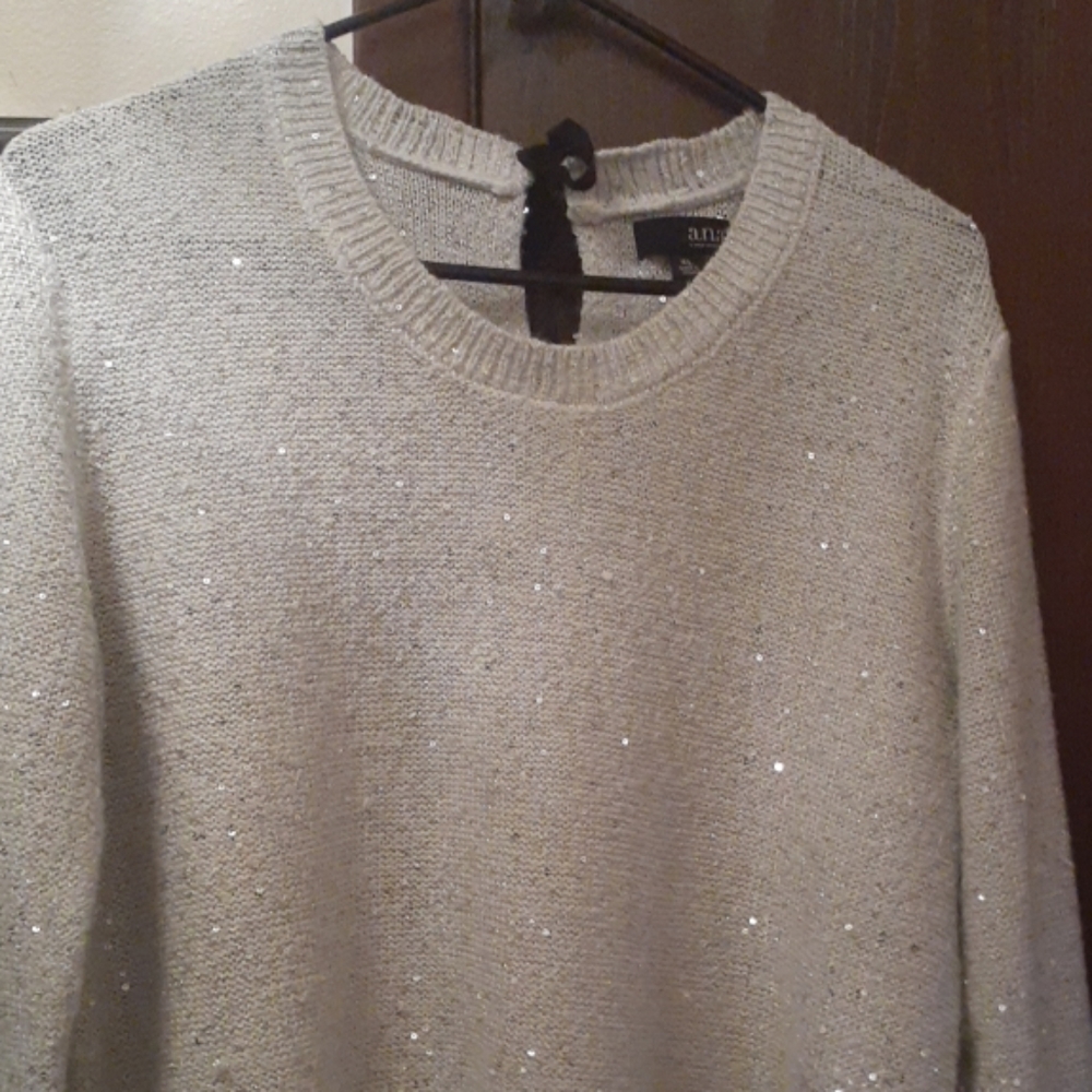 White Sweater with silver metallic thread.